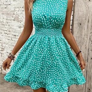 Teal Sleeveless Dress with White Pattern
